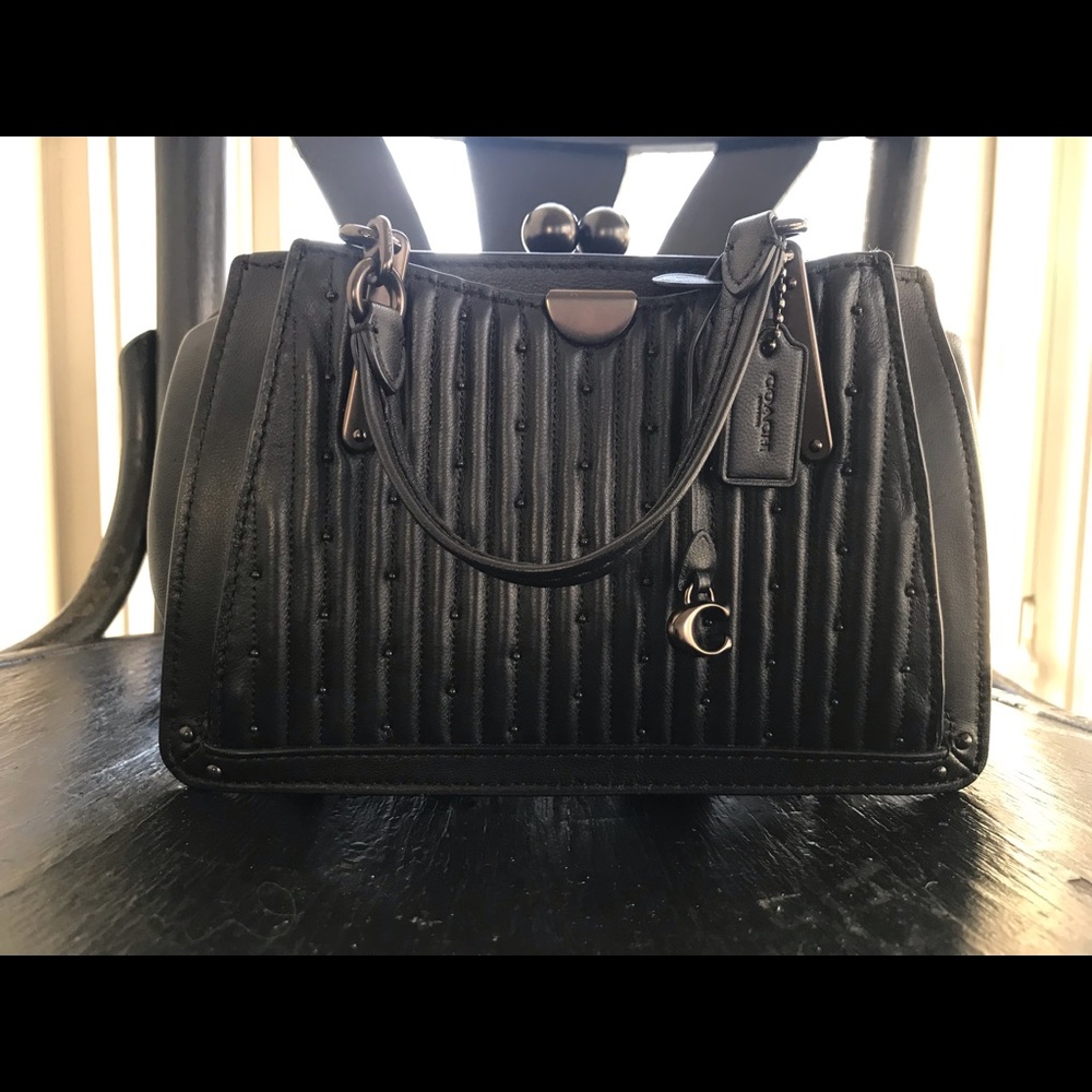 Coach Dreamer kisslock baby bag with Dinky chain